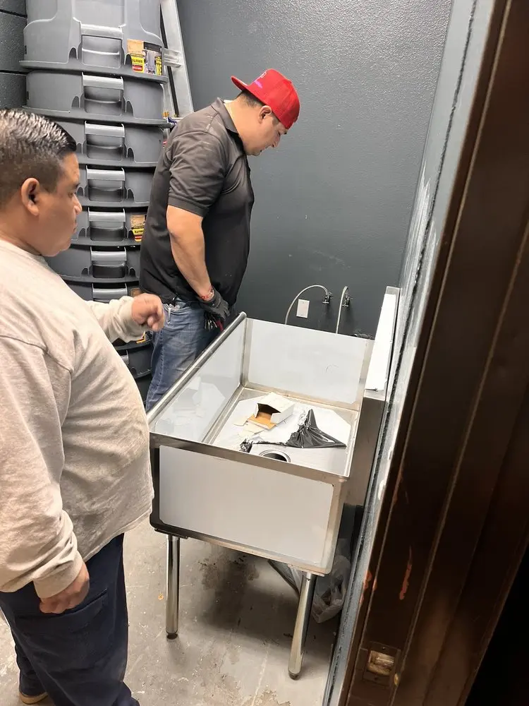 Commercial plumbing and sink installation in Springdale